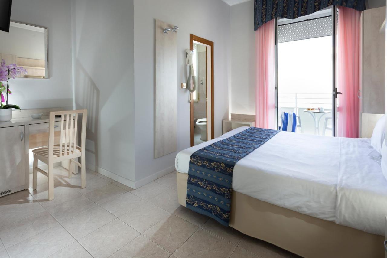 Hotel Vela D'Oro Римини Экстерьер фото